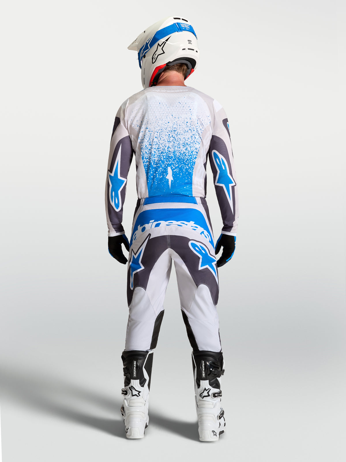 Alpinestars Men's Fluid Drag Jersey, Motocross Gear in Graystone and UCLA Blue, breathable textile for off-road racing.