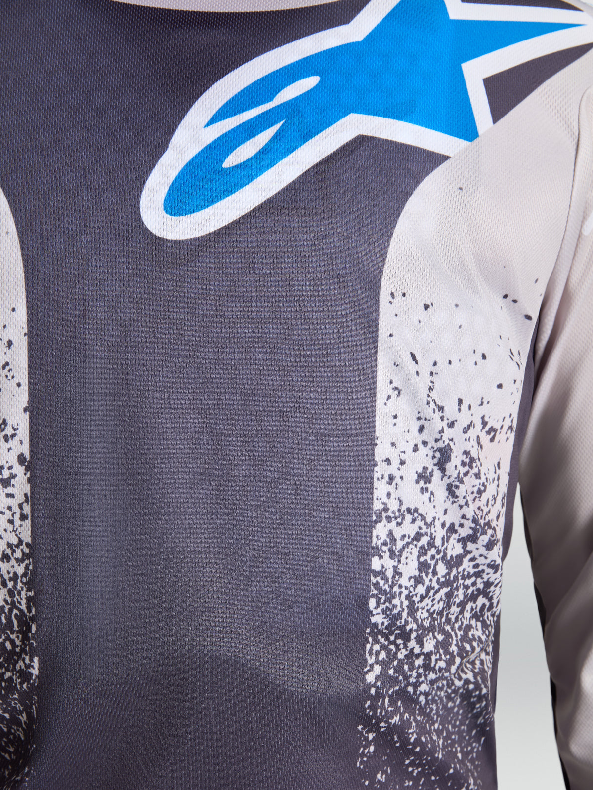 Alpinestars Fluid Drag Jersey, Men's Motocross Jersey, Graystone and UCLA Blue, close-up of breathable moisture-wicking polyfabric with signature star logo.