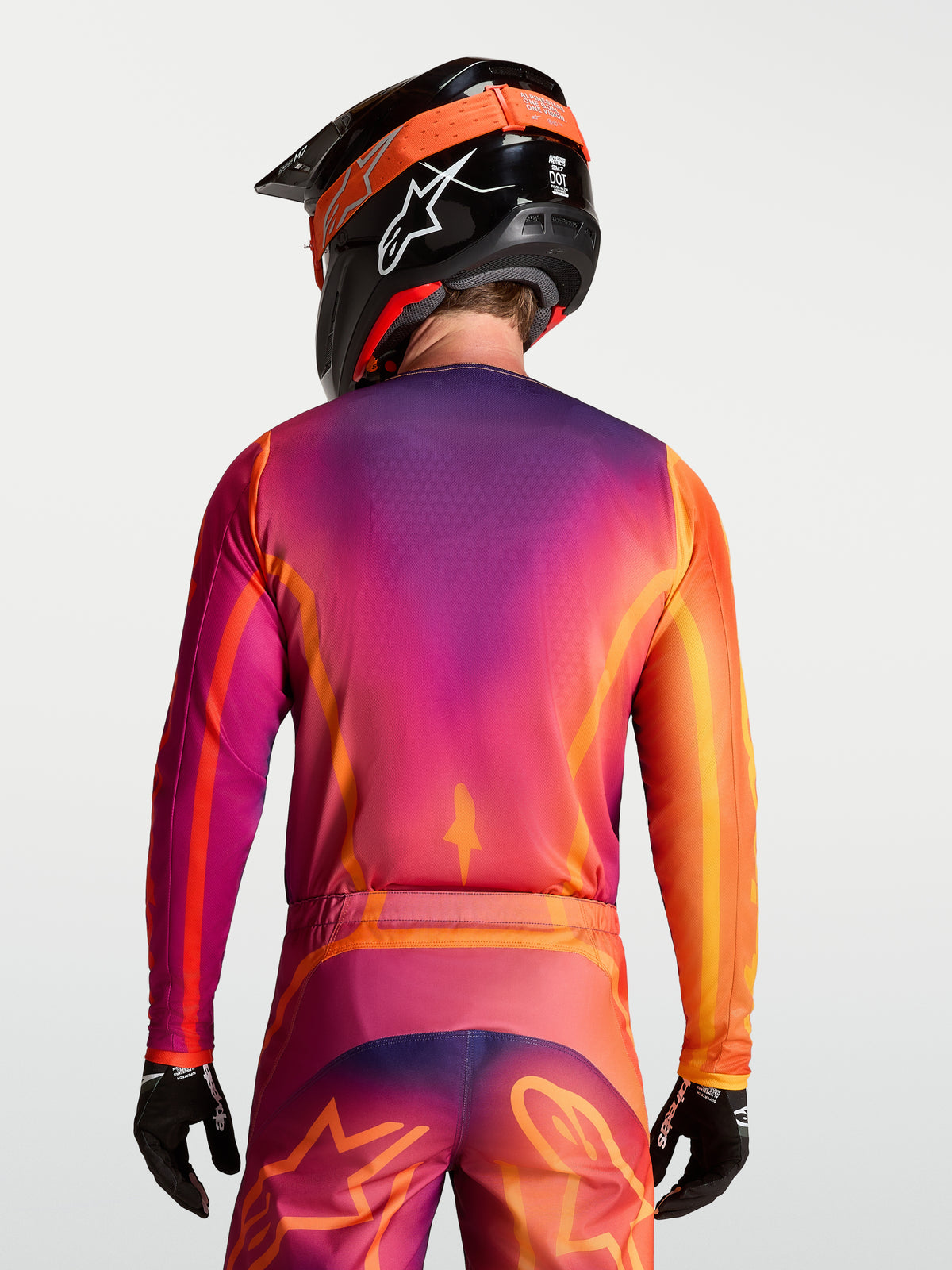 Alpinestars Fluid Kepler Jersey, purple and orange men's motocross jersey with moisture-wicking polyfabric construction.