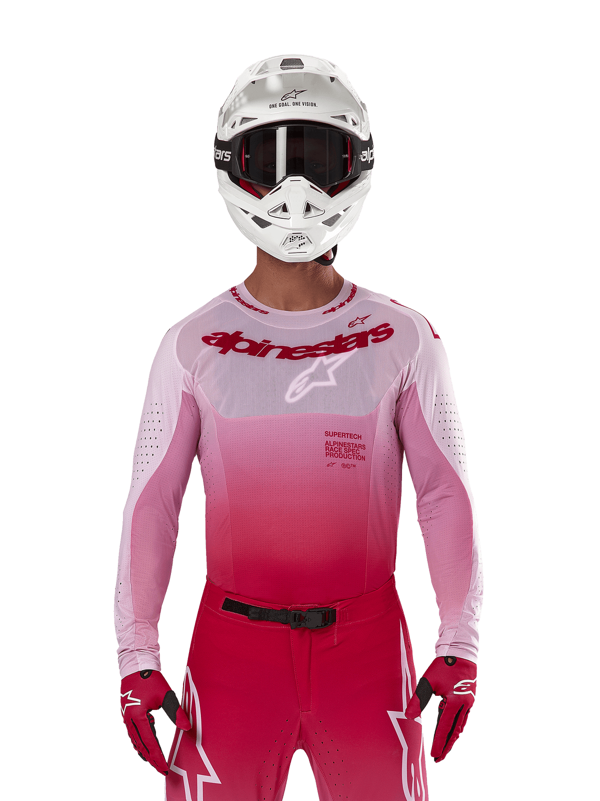 Motocross rider wearing Alpinestars 2024 Supertech Dade Jersey in Red Berry Lilac, matching pants, white helmet with black goggles, and red gloves, coordinated professional racing outfit with gradient pink and red tones