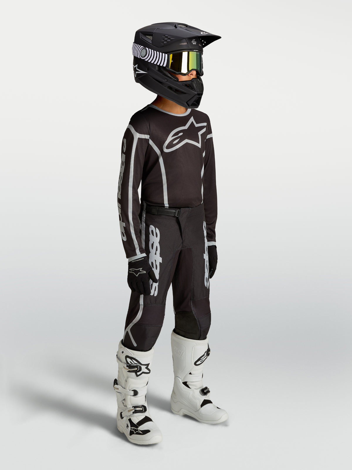 Alpinestars Fluid Apex V2 Jugend-Trikot und Ausrüstungsset, Kinder-Motocross-Outfit, Schwarz und Silber, atmungsaktives Gewebe.