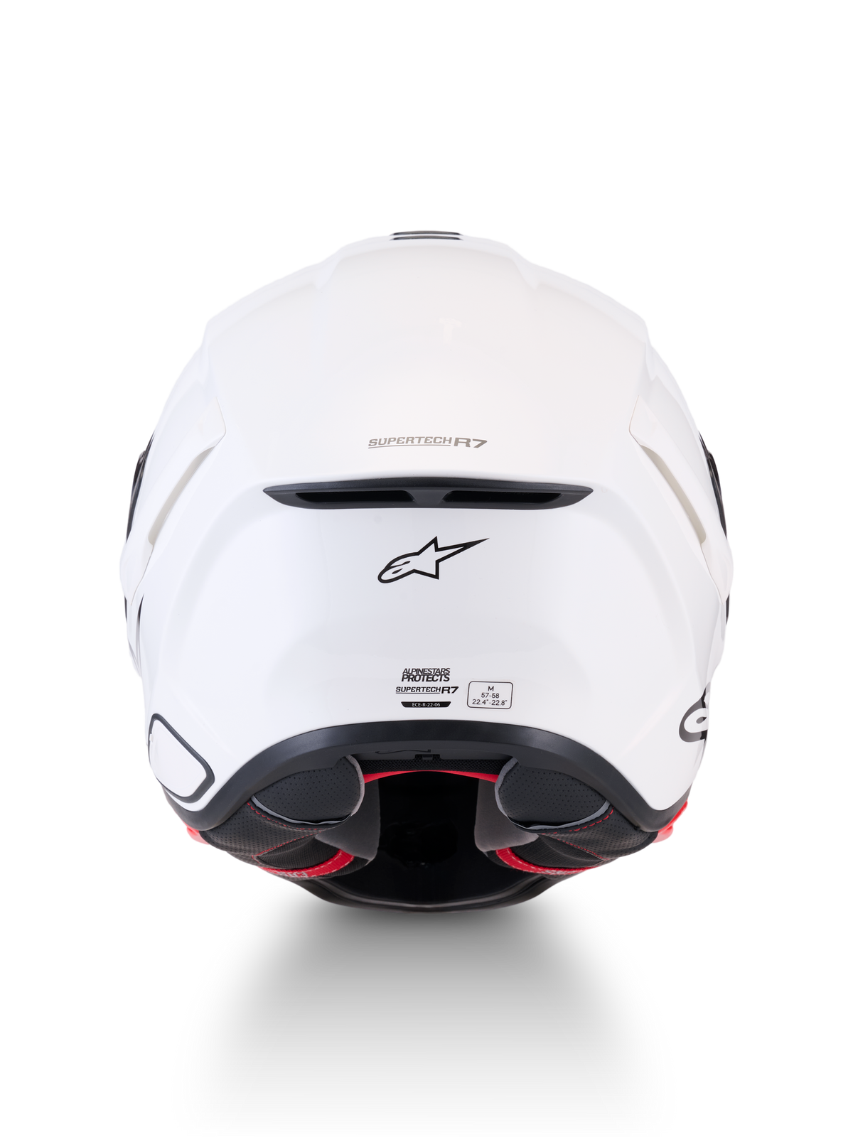 Alpinestars Supertech R7 Helm, weißer Motorradhelm, Rückansicht mit Kohlefaserverbundkonstruktion, Belüftungsöffnung, A-Star-Logo und ECE 22.06-Zertifizierungsetikett