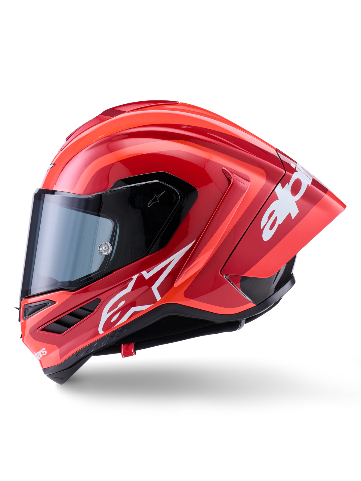 Alpinestars Supertech R10 Arius Helm, Integral-Rennhelm, Glänzendes Rot mit weißen Logo-Grafiken, Seitenprofilansicht mit Fokus auf den aerodynamischen Spoiler und das klare Visier, Carbon-Multi-Composite-Schale für den professionellen Motorsport