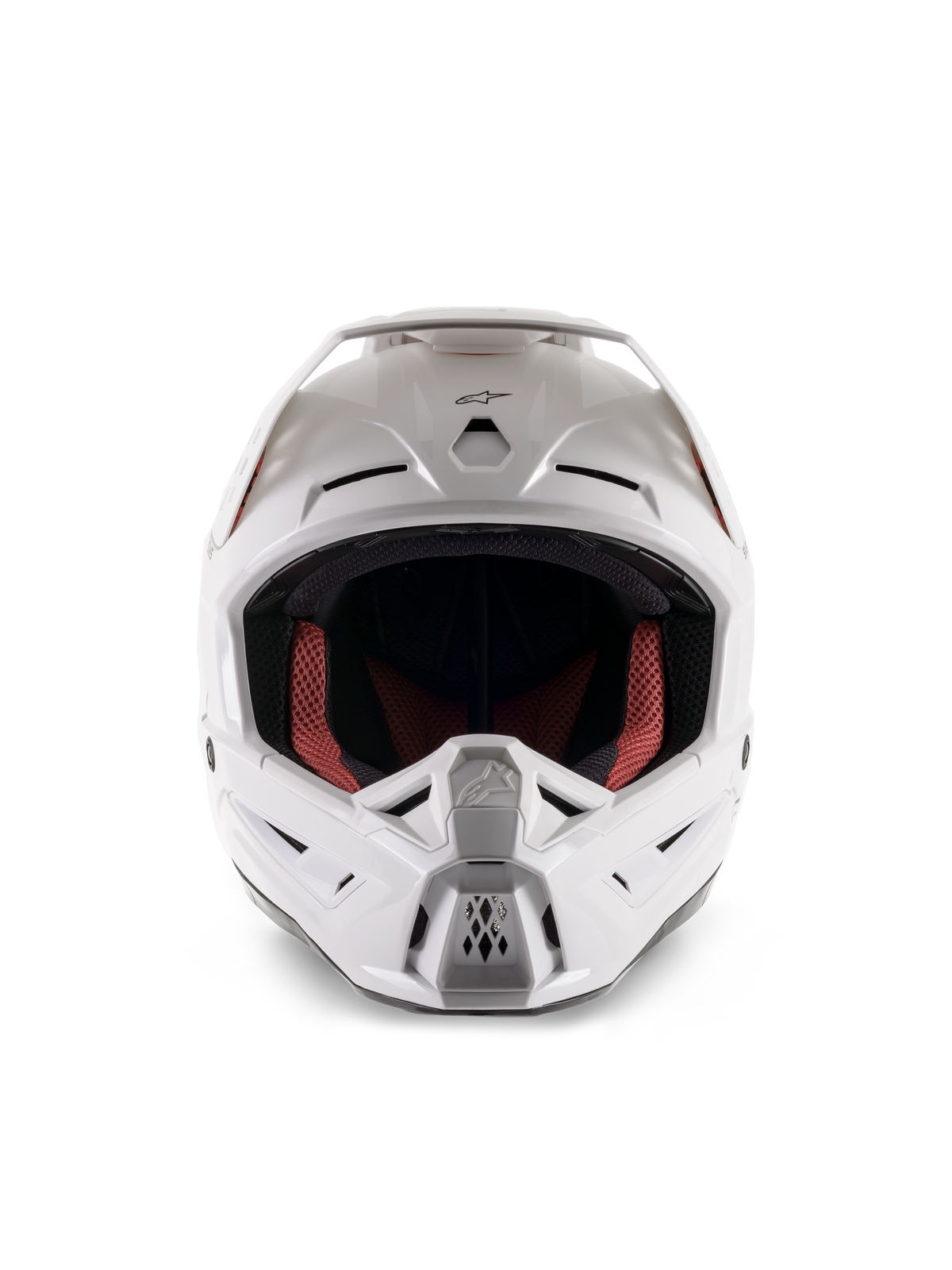 Alpinestars S-M5 Solid Helm ECE 22.06, Motocross-Helm, Weiß Glänzend, Vorderansicht, mit mehreren Lufteinlässen an Kinn und Stirn, breites Visier, rot-schwarzes Innenfutter, schlankes und aerodynamisches Design für den Offroad-Rennsport