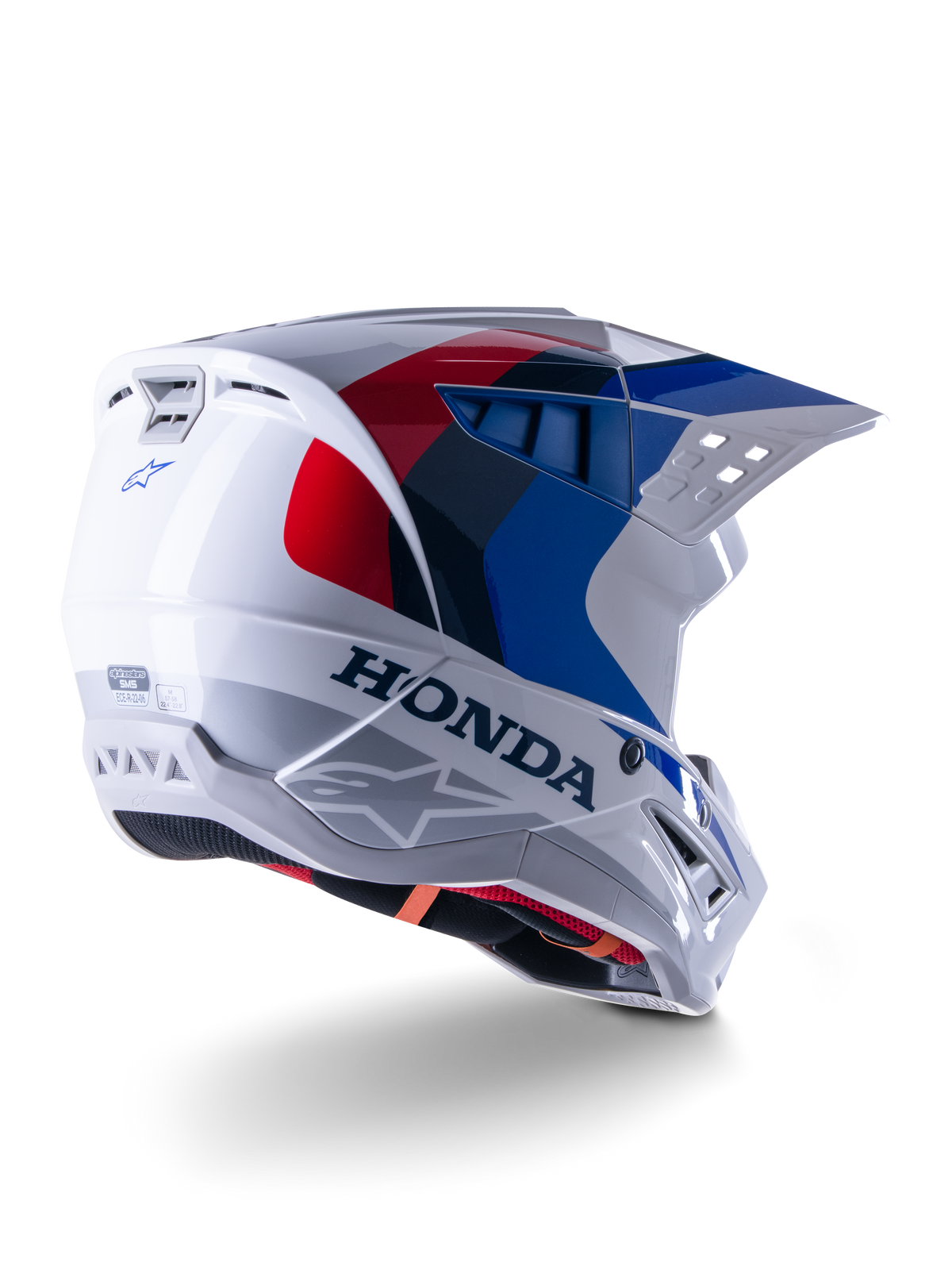 Alpinestars Honda S-M5 ECE Helm, Motocross-Helm, Weiß, Blau und Rot Glänzend, mit markantem Honda-Branding und Alpinestars-Logos, aerodynamische Schale mit integrierten Belüftungsöffnungen und verstellbarem Visier, Schutzausrüstung für den Offroad-Rennsport