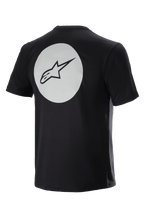 Alpinestars Dot Tech Tee, kurzärmeliges Fahrradtrikot, Schwarz, Rückansicht mit großem weißem Kreis und schwarzem A-star-Logo, feuchtigkeitsableitendes DriRelease-Gewebe zum Mountainbiken
