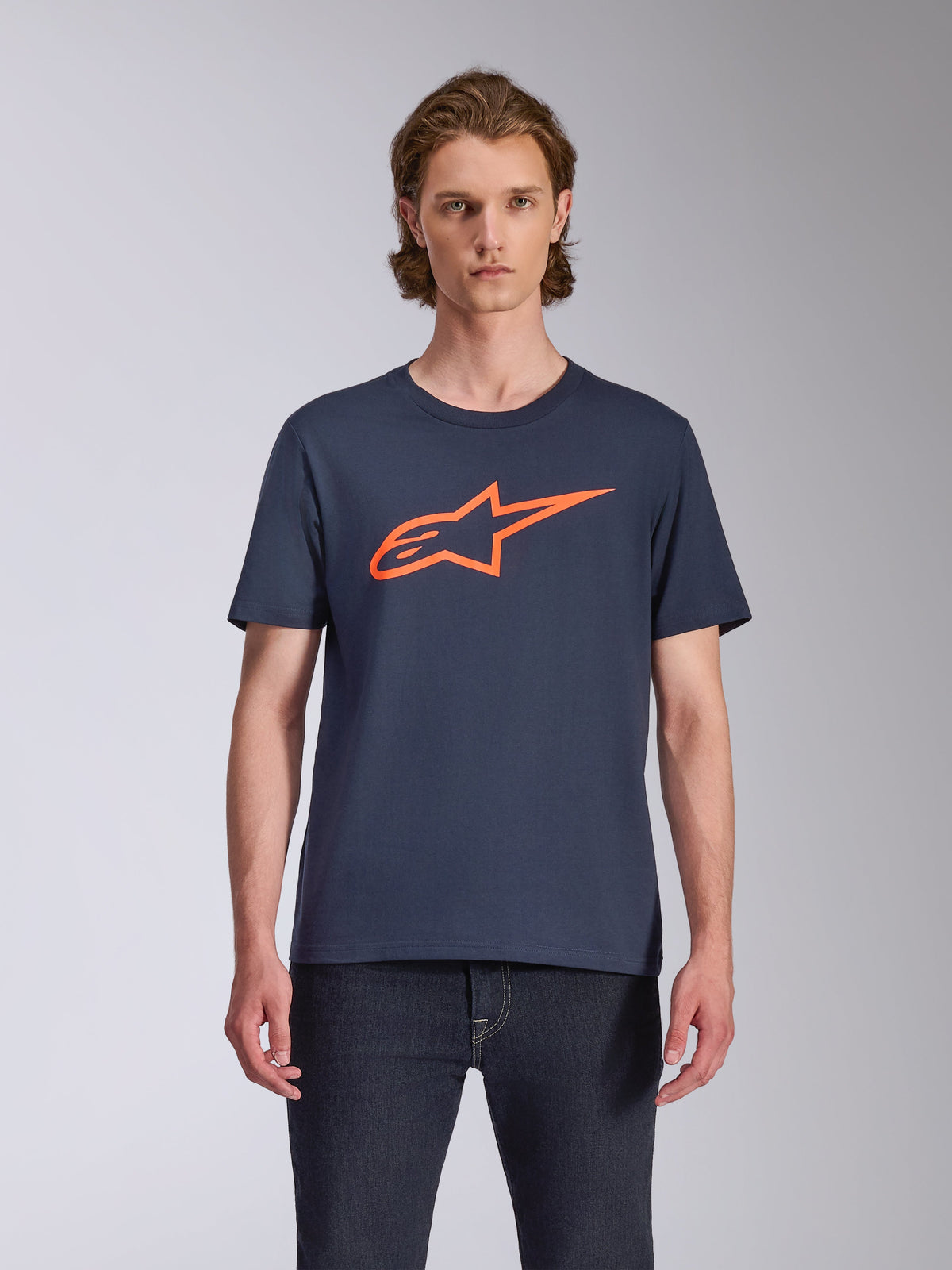 Alpinestars Ageless 2.0 CSF Tee, Short Sleeve T-Shirt, Navy Blue with Orange Logo, Front MX Helmet Art, Casual Motorsport-Inspired Streetwear