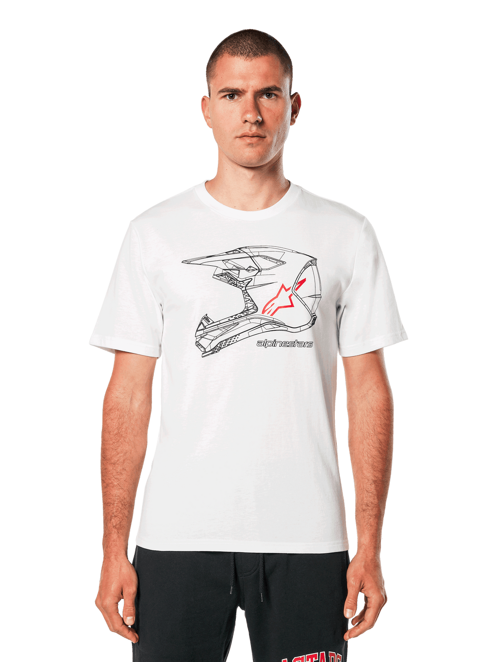 Alpinestars MX Helmet CSF Tee, weißes Kurzarm-T-Shirt, schwarze Wireframe-Grafik eines Motocross-Helms mit rotem Stern-Logo, lässige, vom Motorsport inspirierte Streetwear, getragen von einem Model