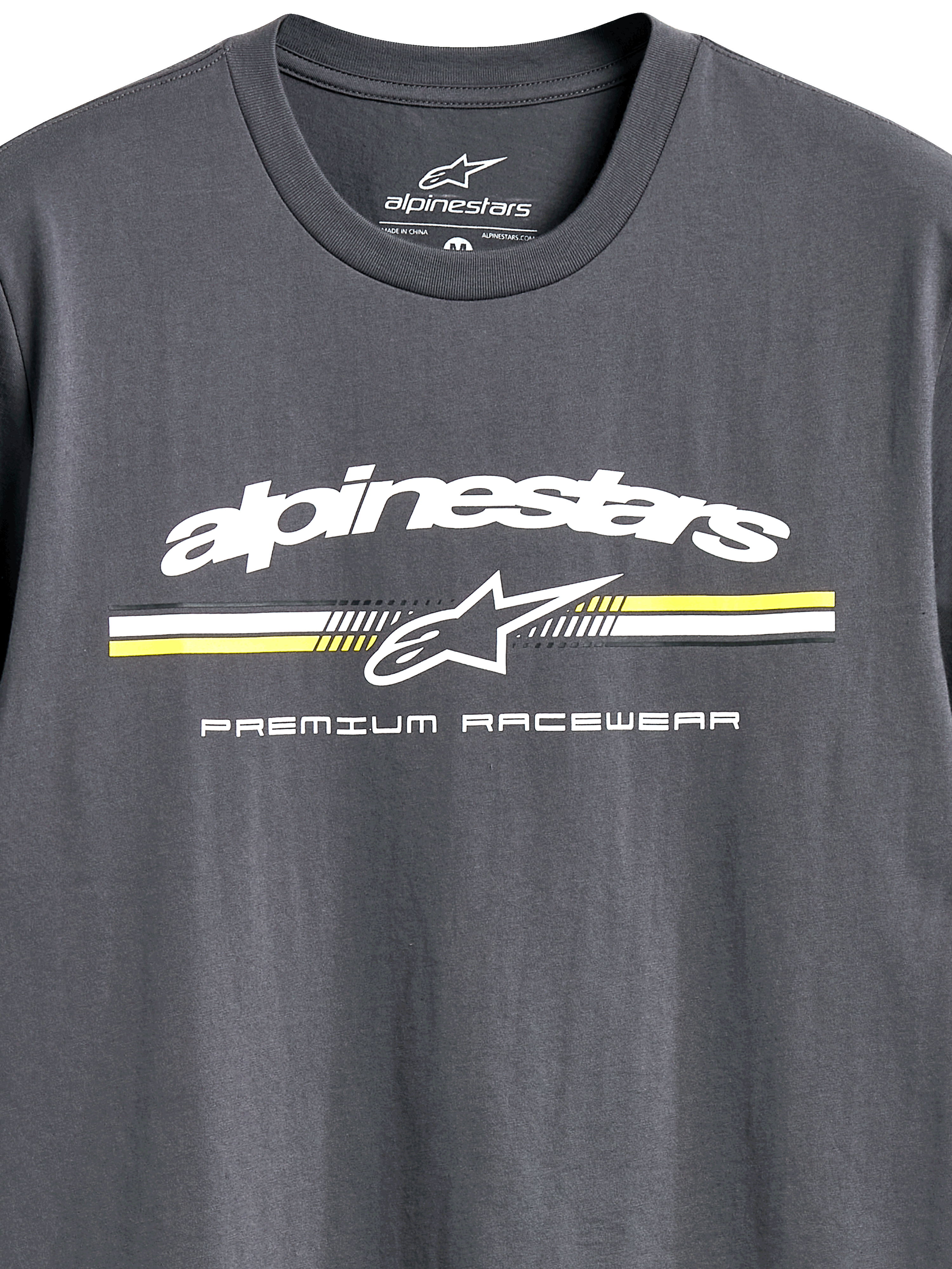 Alpinestars Prevail CSF Tee, Short Sleeve T-Shirt, Charcoal, White Alpinestars Logo with Yellow and White Paddock-Style Stripes, 'Premium Racewear' Text, Casual Motorsport Sportswear