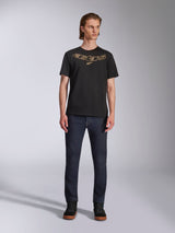 Alpinestars Luxo CSF Tee, Short Sleeve T-Shirt, Black, Tan outlined Astars chest logo, worn by model with dark denim jeans and black high-top shoes, Casual Motorsport Streetwear