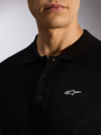 Alpinestars Endeavor Classic Polo, Black pique short sleeve polo, three-button placket, ribbed collar, white Astars logo HD print, casual motorsport-inspired streetwear