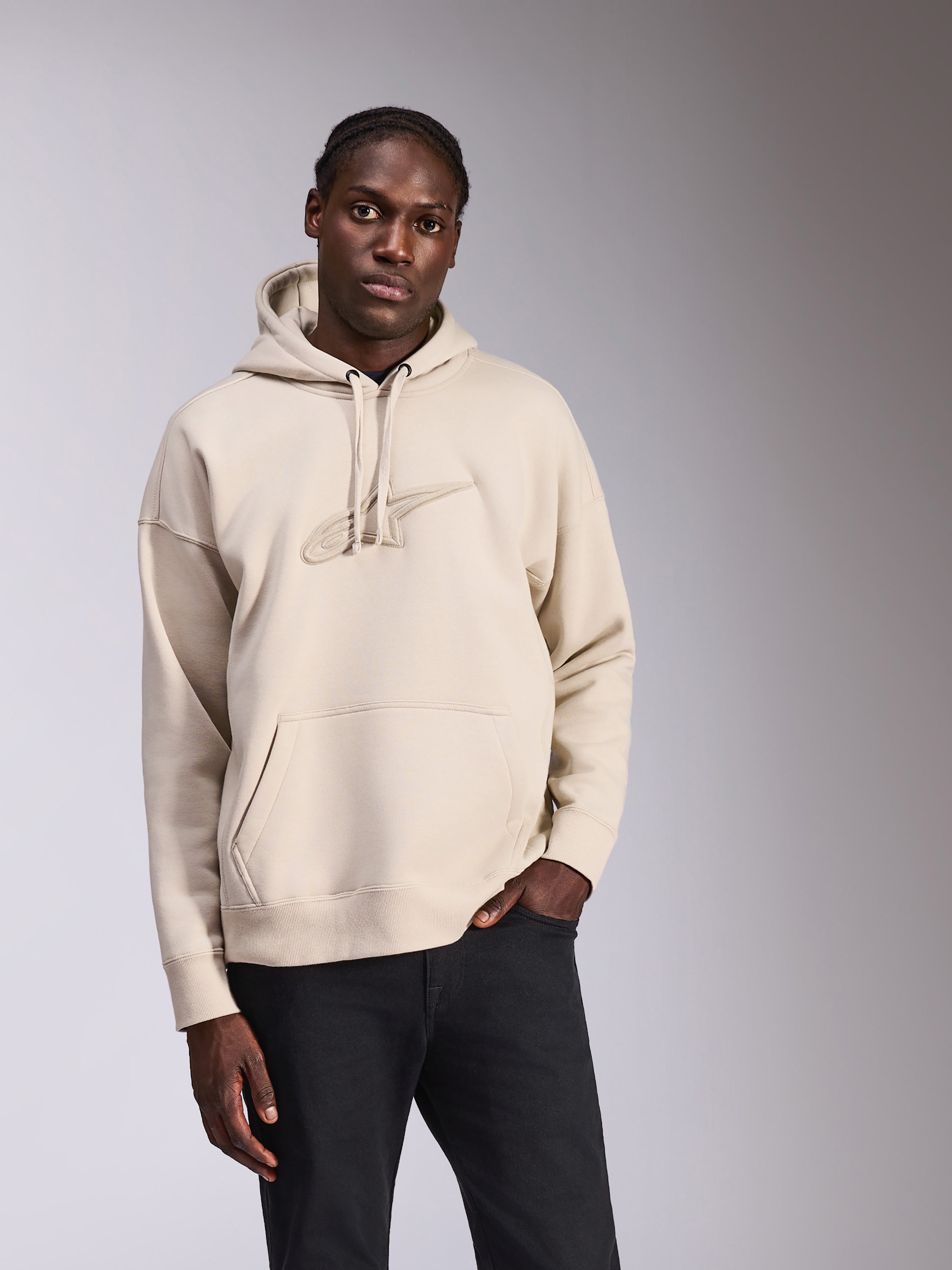 Alpinestars Emergent Oversized Hoodie, casual streetwear, off-white fleece with tone-on-tone 3D embroidered logo, kangaroo pocket, drawstring hood, oversized fit for a modern silhouette