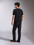 Alpinestars Alter Oversized CSF Tee, Short Sleeve T-Shirt, Black, back view, worn with black pants and sneakers, oversized fit, casual lifestyle streetwear