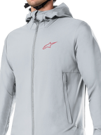 Alpinestars A-Dura Thermal Jacket, Cycling Jacket, Titanium Gray, featuring a fleece-lined hood and zippered pockets, lightweight PrimaLoft insulation for mountain biking and cold-weather off-road riding