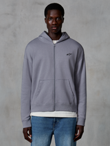 Alpinestars Essentials Ageless Zip Hoodie, Silver, casual streetwear worn by model, full-zip fleece with small black Astars logo on the chest, kangaroo pockets, relaxed fit design