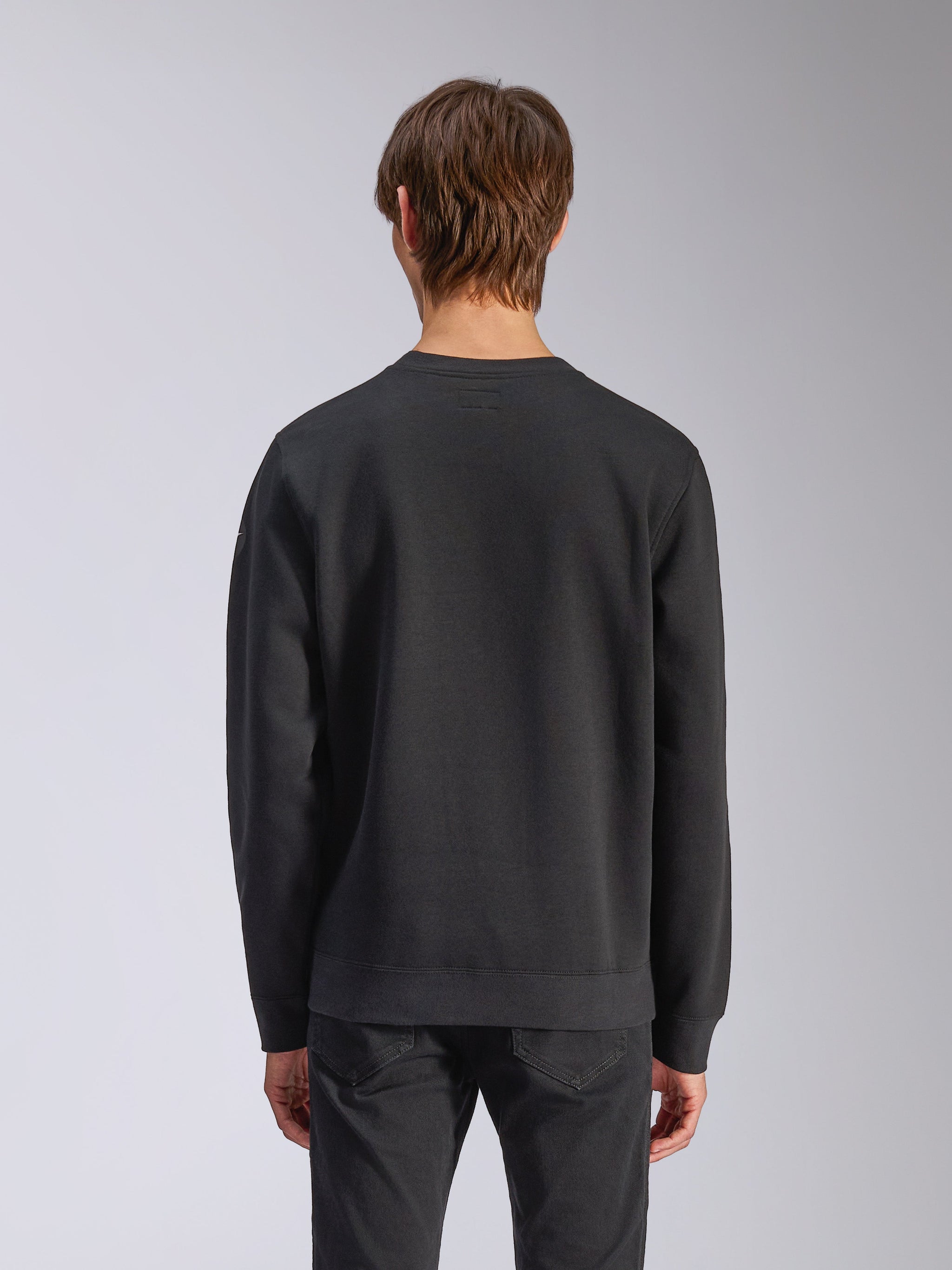 Alpinestars Bettern Crew, Crew Neck Sweatshirt, Black, back view on model, featuring ribbed cuffs and hem, casual motorsport streetwear