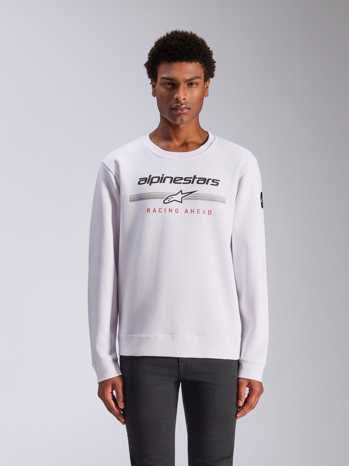 Alpinestars Bettern Crew, Crewneck Sweatshirt, White, featuring black Alpinestars logo with gray horizontal stripes and red 'RACING AHEAD' text, casual motorsport streetwear