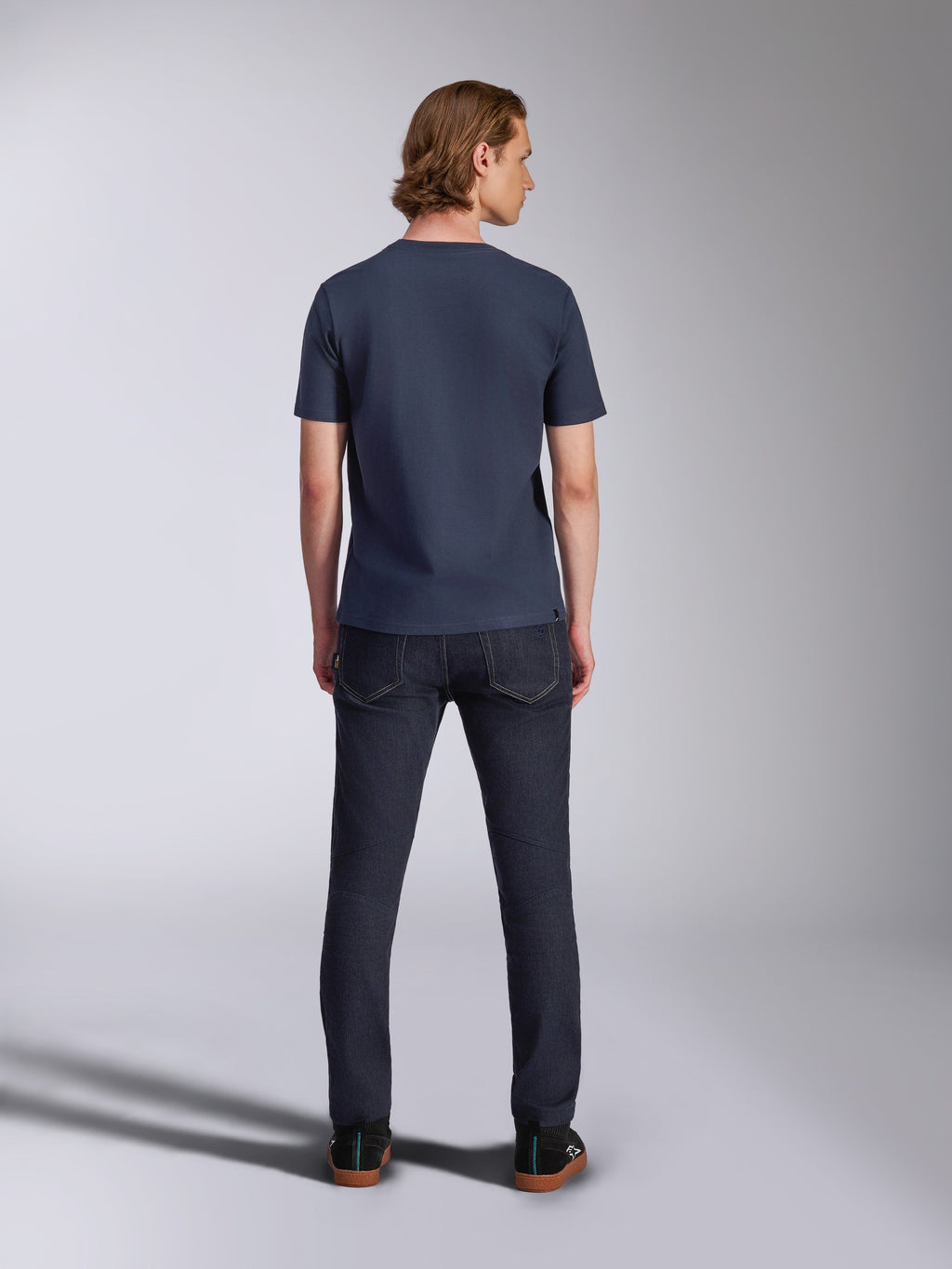Alpinestars Fasting CSF Tee, Short Sleeve T-Shirt, Navy Blue, back view, worn with dark denim jeans, casual motorsport streetwear