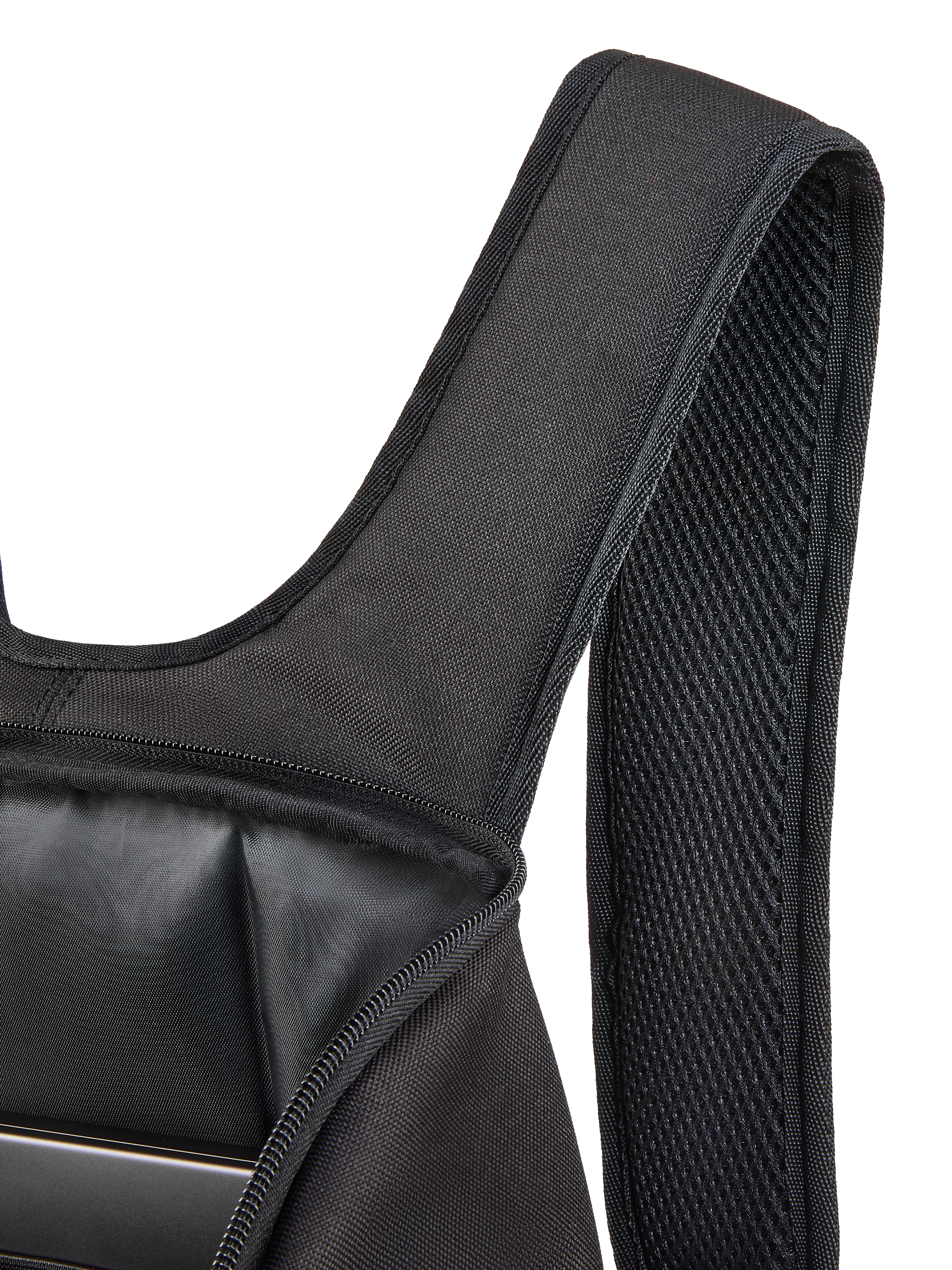 Alpinestars Defcon V3 Backpack, close-up of the padded air mesh shoulder strap and open main compartment, black 600D polyester, showing internal laptop sleeve and durable textile construction.