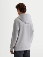 Alpinestars Entity Oversized Hoodie, Sportswear-Zip-Hoodie für Herren und Damen, Grau, Rückansicht am Model, lässige Oversized-Passform, überschnittene Schultern, selbstgefütterte Kapuze und Rippbündchen.