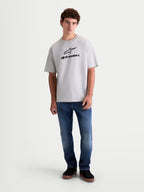 Alpinestars Prelude Oversized CSF T-Shirt, Herren-Sportswear-T-Shirt in Zementgrau, schwarzes Astars-Logo und Schriftzug auf der Brust, lockere Oversized-Passform, Kurzarm, weiches Baumwoll-Polyester-Mischgewebe.