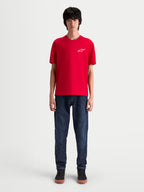 Alpinestars Combo Back CSF Tee, Men's Short Sleeve Sportswear T-Shirt, Red with a white Astars chest logo, cotton-poly blend fabric, on-model front view showcasing clean motorsport-inspired style.