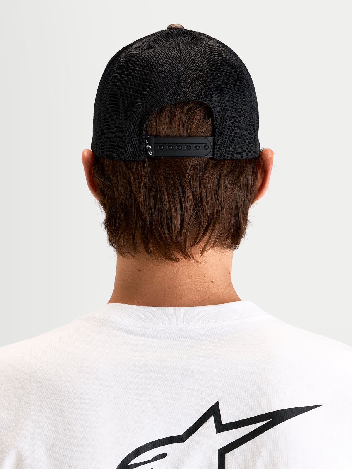 Alpinestars Thicket Realtree Trucker-Kappe, Sportswear-Snapback-Kappe in Schwarz, Rückansicht des Modells mit verstellbarem Snapback-Verschluss und aufgesticktem Astars-Logo