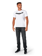 Alpinestars Elliptic CSF Tee, Short Sleeve T-Shirt, White, Black arched Astars logo with orange star symbol, worn by model with black jeans and sneakers, casual motorsport streetwear