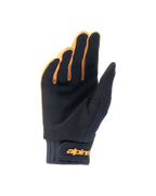 Alpinestars A-Dura Handschuhe, Mountainbike-Handschuhe, Dunkelgold und Schwarz, Handflächenansicht mit synthetischem Wildleder, Neoprenmanschette mit goldenem Klettverschluss am Handgelenk, entwickelt für Grip und Beweglichkeit beim Radfahren
