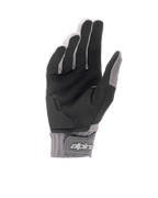 Alpinestars A-Dura Gel Handschuhe, Mountainbike-Handschuhe in Hellgrau und Schwarz, Handflächenansicht mit schwarzem synthetischem Wildleder und Gel-Einlage, Neopren-Manschette mit Klettverschluss am Handgelenk und Markenlogo, ergonomische Fahrradausrüstung