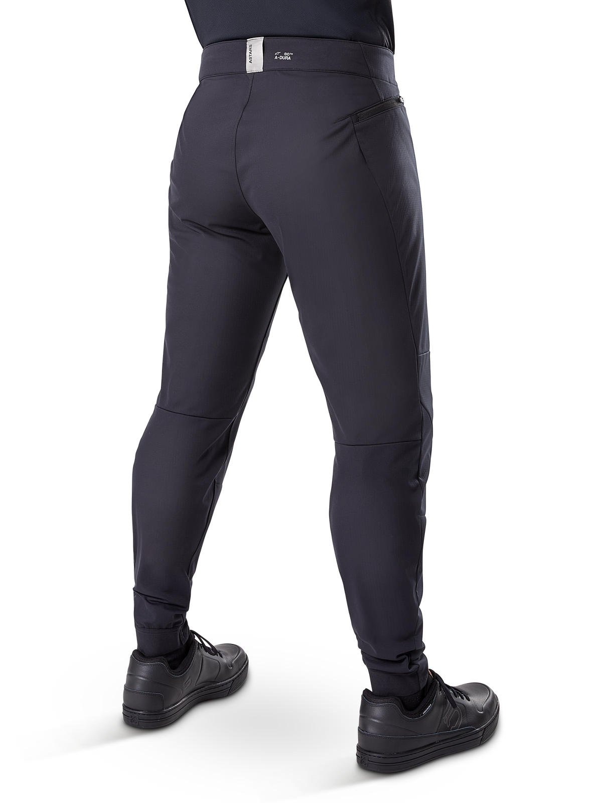 Alpinestars A-Dura Thermo-Hose, Mountainbike-Hose, Schwarz, Rückansicht mit Reißverschlusstaschen und Branding am Bund, schmal zulaufende Passform für Radsport bei kaltem Wetter
