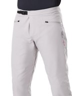 Alpinestars A-Dura Waterproof Pants, MTB Pants, Titanium gray, front view showing black ratchet waist closure and zippered hand pockets, durable waterproof construction for mountain biking