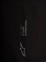 Detail of black Alpinestars A-Dura Ride Liner Shorts with white logos on 4-way stretch performance cycling fabric.