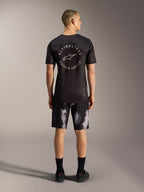 A-Dura Ride Shorts in Black Camo, robuste 4-Wege-Stretch MTB-Shorts für Herren in der Rückansicht.