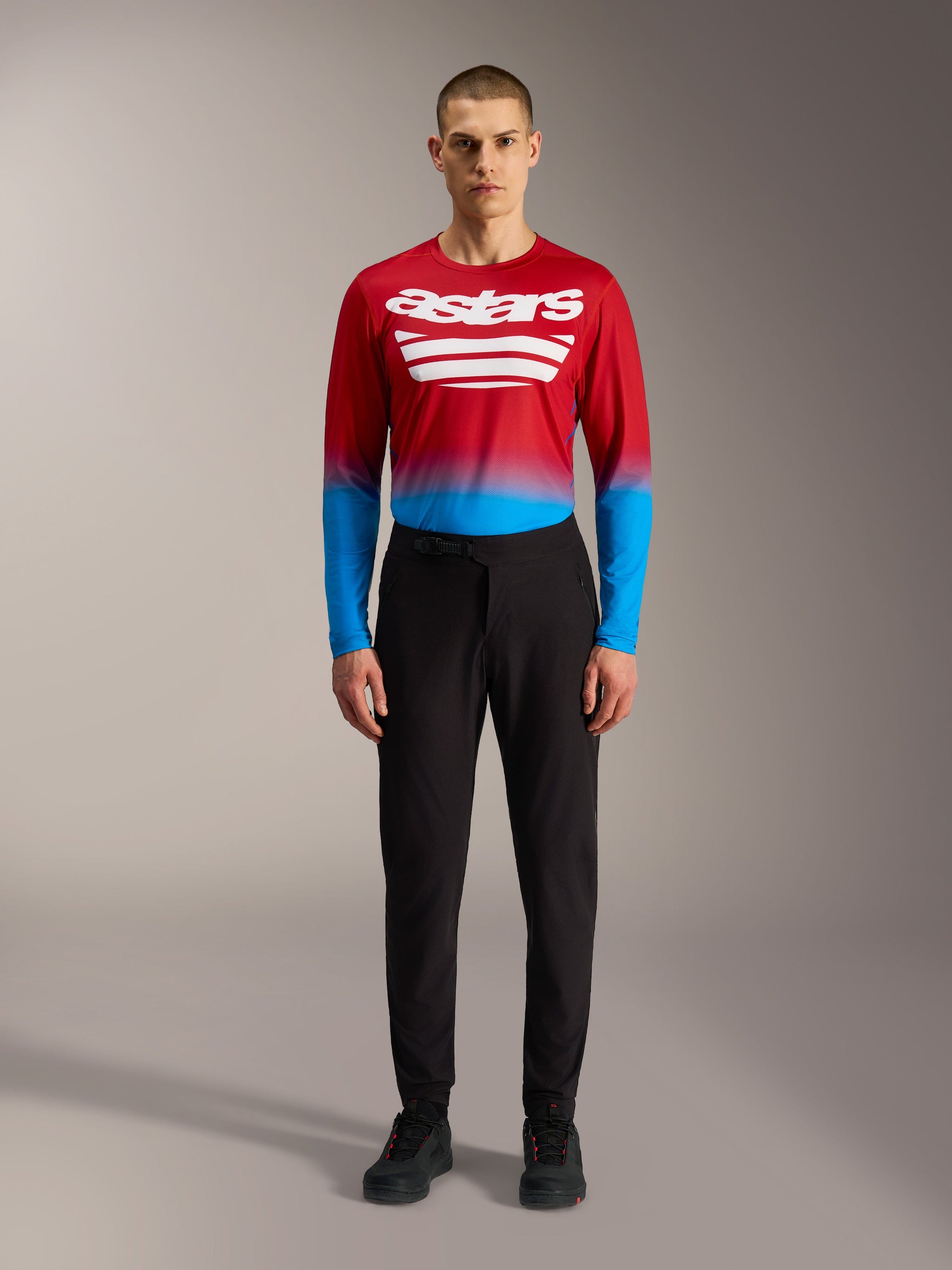 Black A-Dura Ride Pants, durable MTB trousers featuring 4-way stretch and a ratchet closure system for off-road cycling.