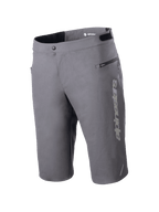 Alpinestars A-Dura Elite Shorts, Mountain Bike Shorts, Dark Gray, featuring a vertical Alpinestars logo on the leg, zippered side pocket, front snap closure, and adjustable waist tabs for off-road cycling.