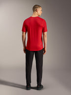 Rotes A-Dura Ride Kurzarmtrikot, Rückansicht mit verlängertem Saum und leichtem Funktionsgewebe für MTB.