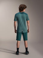 Alpinestars A-Dura Shorts and A-Dura Lipan SS Jersey, Dark Pine green, back view on a model, performance mountain bike apparel featuring short sleeve jersey and matching shorts, off-road cycling outfit