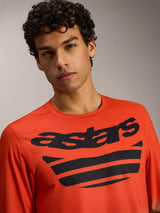 Oranges A-Dura ASTARS Langarmtrikot 2.0 mit markanten schwarzen Brustlogos, Performance-MTB-Bekleidung.