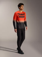Orange-schwarzes A-Dura ASTARS Langarmtrikot 2.0 mit markantem Brustlogo für Mountainbike-Performance.