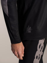 Black A-Supra Elite Jersey featuring micro-perforated fabric and signature 'One Goal. One Vision.' racing slogan.