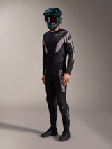 A-Supra Elite MTB kit in black and grey, featuring performance stretch pants and jersey with bold Alpinestars branding.