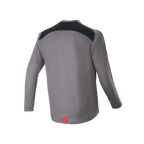Alpinestars A-Dura Dri Astar Langarmtrikot, Dunkelgrau, Rückansicht mit schwarzen Mesh-Belüftungseinsätzen über den Schultern und einem kleinen roten Etikett am Saum, technische Mountainbike-Bekleidung