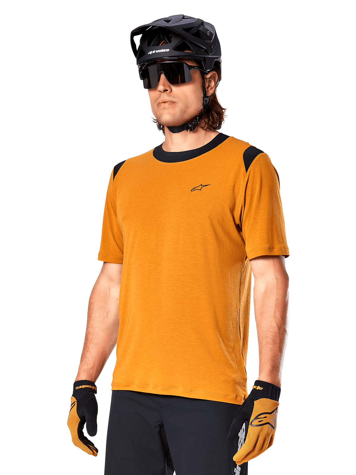 Alpinestars A-Dura Dri Wool Jersey - Short Sleeve, MTB cycling jersey, Dark Gold with black accents, short-sleeve technical wool blend shirt with black shoulder panels, worn with black mountain bike helmet and matching gloves