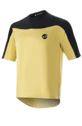 Alpinestars Drop Meta Trikot – Kurzarm, MTB-Fahrradtrikot, Gold und Schwarz, Mesh-Konstruktion mit farblich abgesetzten Schulterpartien, kreisförmiges Brustlogo und verlängerter Rücksaum.