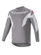 Alpinestars A-Supra Race Jersey, Long Sleeve MTB Jersey, Dark Gray with white paneling, featuring white Alpinestars logo on the chest and red star logos on shoulders, technical micro-perforated fabric with a dropped tail design for off-road cycling
