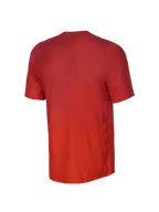 Alpinestars Youth A-Dura Rise Kurzarmtrikot, Rückansicht, Spicy Orange, Jacquard-Stoffstruktur, kleines schwarzes Astars-Logo an der Seite, verlängerter Rückensaum für Schutz beim Mountainbiken.