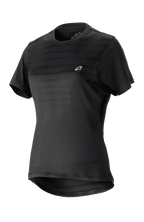 Alpinestars Stella Alps Constellation Trikot für Damen, Kurzarm-Mountainbike-Jersey, Schwarz mit dezenten Querstreifen auf der Brust, kleines weißes Logo, Rundhalsausschnitt, verlängerte Rückenpartie für optimale Abdeckung, leichtes atmungsaktives Material für MTB