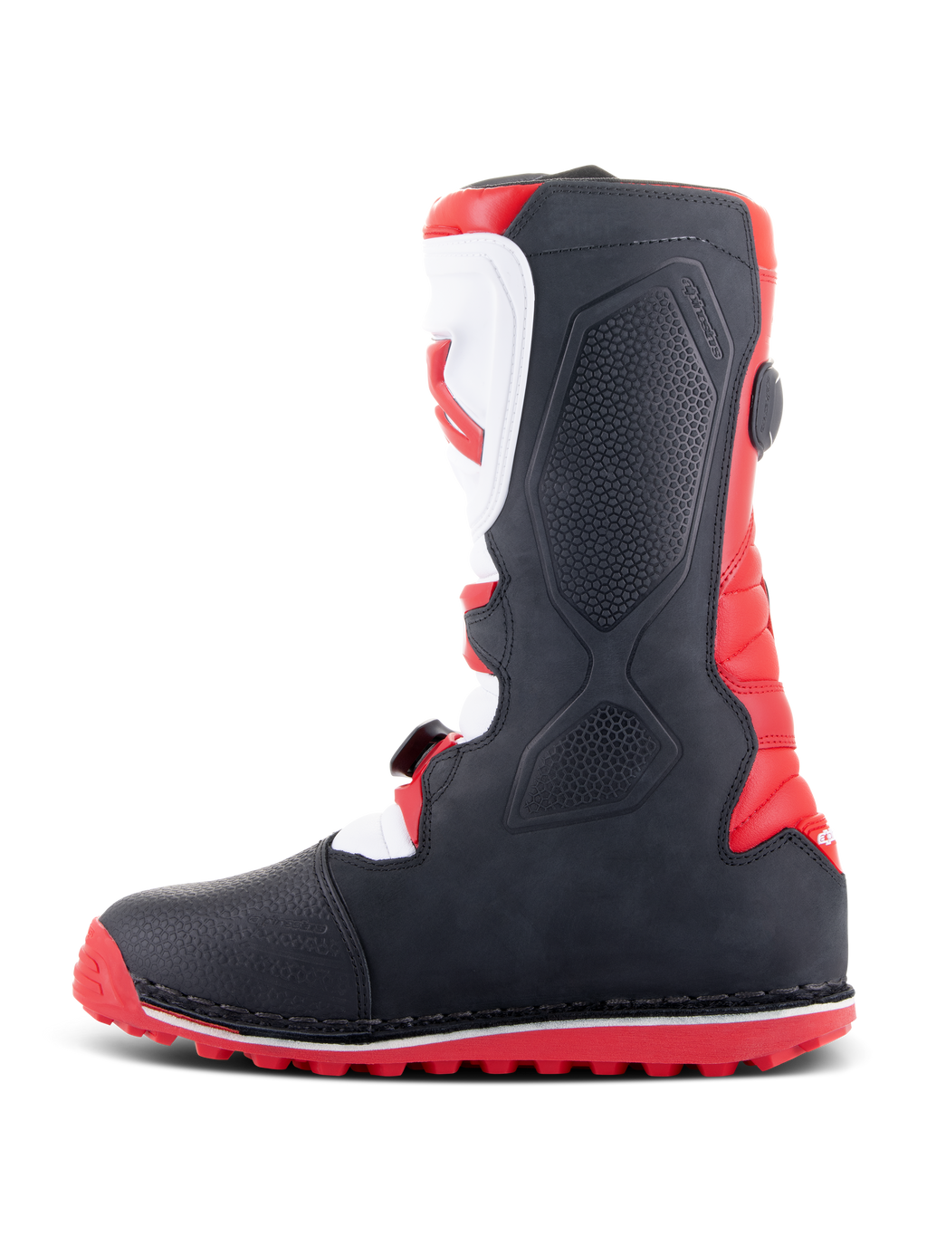 Alpinestars Tech-T Stiefel, Trial-Stiefel, Hellrot, Schwarz und Weiß, Seitenansicht zeigt ergonomische weiße Schienbeinplatte mit rotem Logo, schwarze texturierte Einsätze und rote Profilsohle für Offroad-Traktion