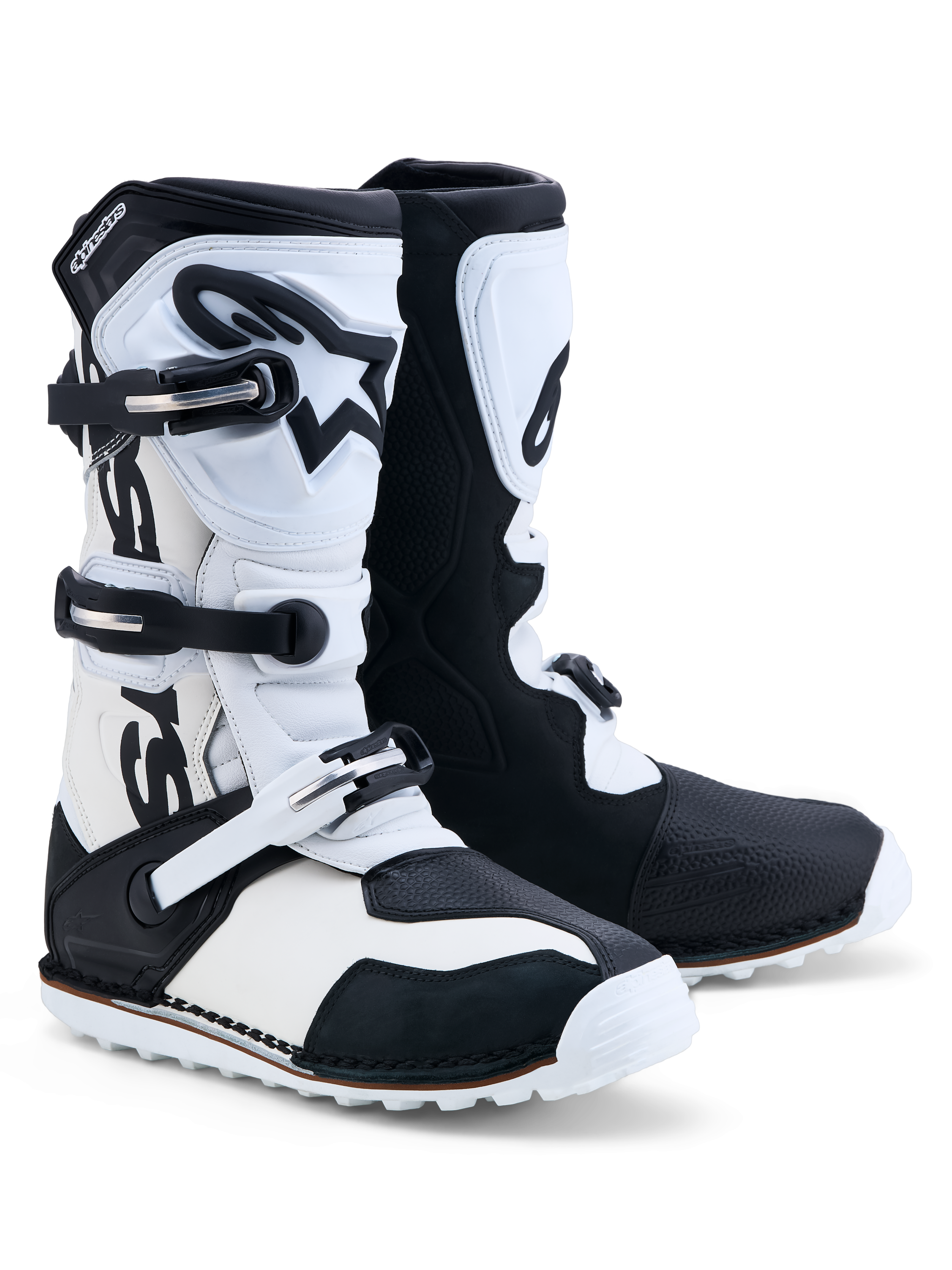 Alpinestars Tech-T Stiefel, Trial-Motorradstiefel in Schwarz und Weiß, aus Leder mit dreifachem Schnallenverschluss und TPU-Schienbeinplatte.